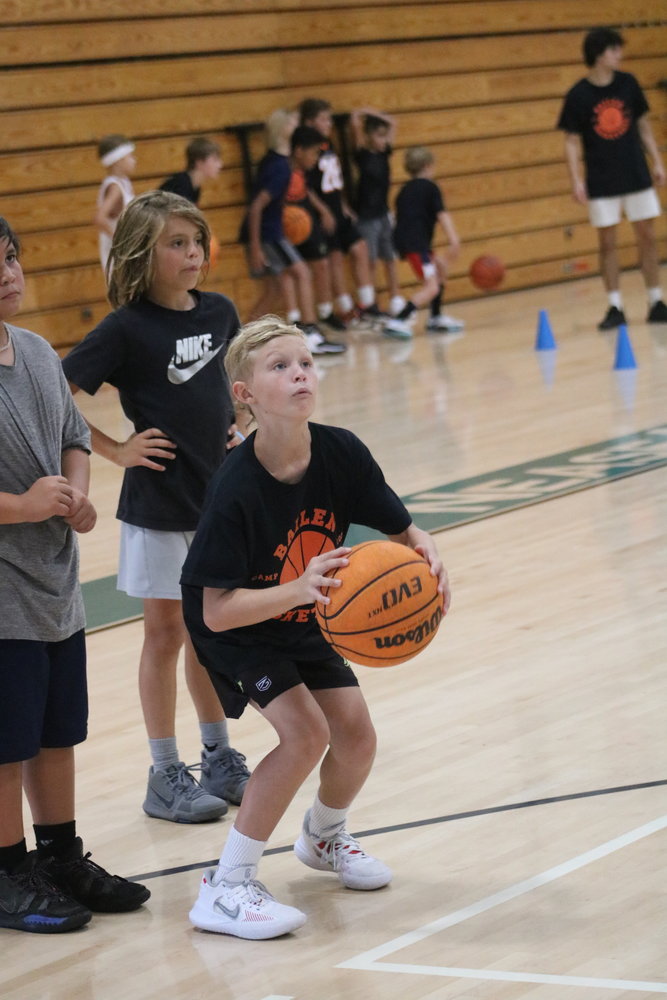 Campers take part in a shooting drill.